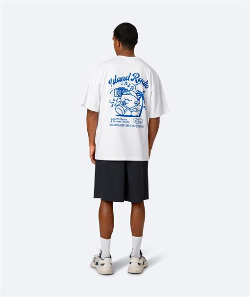 On Vacation Island Radio - Unisex T-shirt met korte mouwen