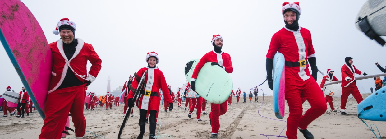 Surfing santas